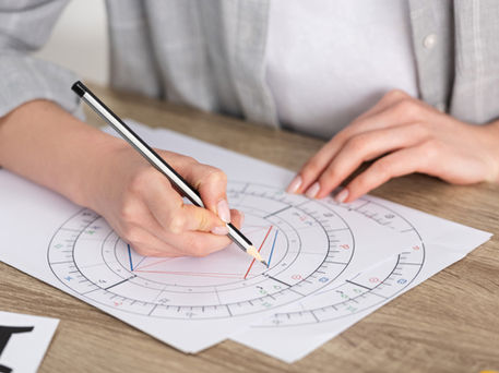 Astrologer Writing Natal Chart