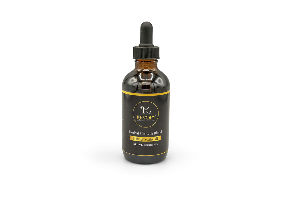 Eye-level view of amber glass bottle with herbal infused oil and fresh herbs