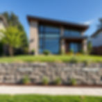 make me a picture of a regular modern house retaining wall without a person on there.jpg