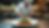 Eye-level view of a private chef plating a gourmet dish in a modern kitchen