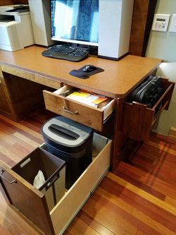 Full depth drawer and trash/shredder pullout.