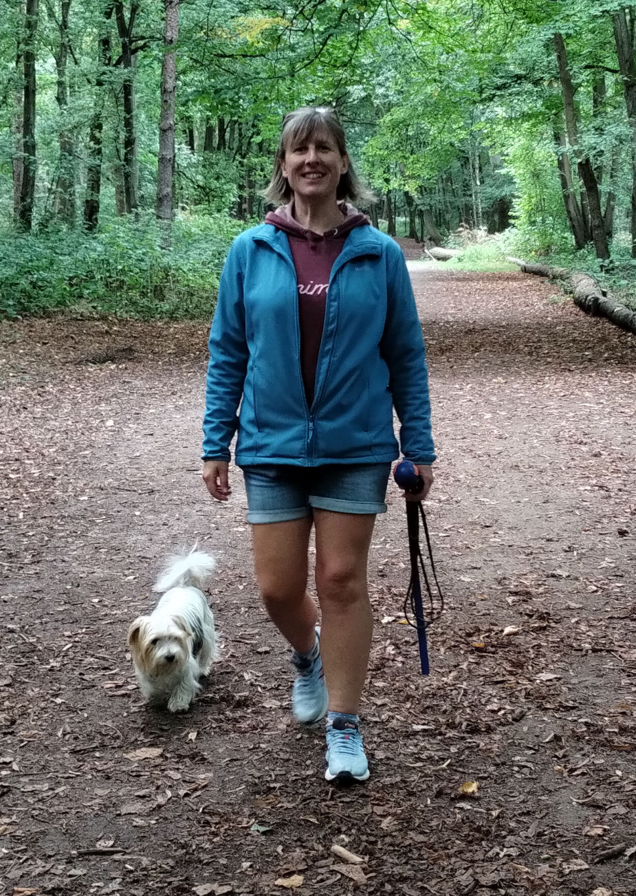 Picture of Rachel (Owner of Poppets Dog Training) walking her dog.