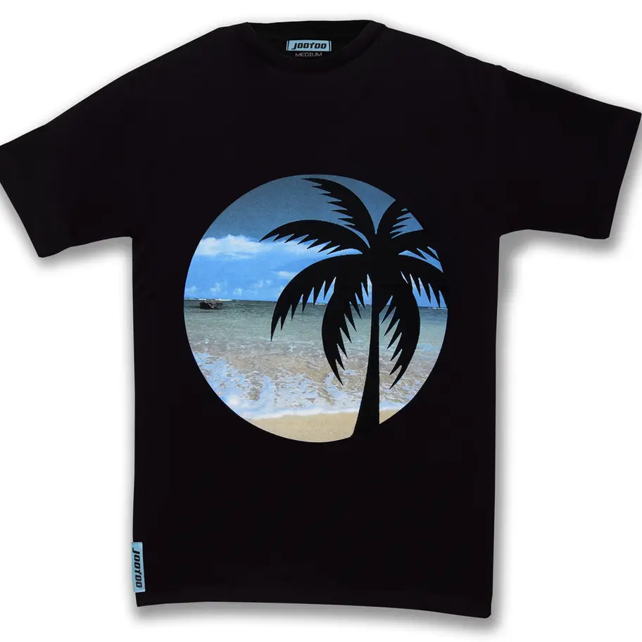 Black Crew Neck Tee/Ocean-Palm Print with palm tree design over beach background.