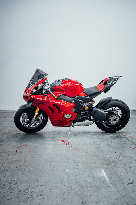 Red Ducati Panigale motorcycle with custom wrap in Temecula, CA