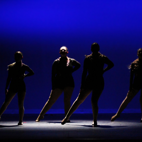 dancers posed on stage