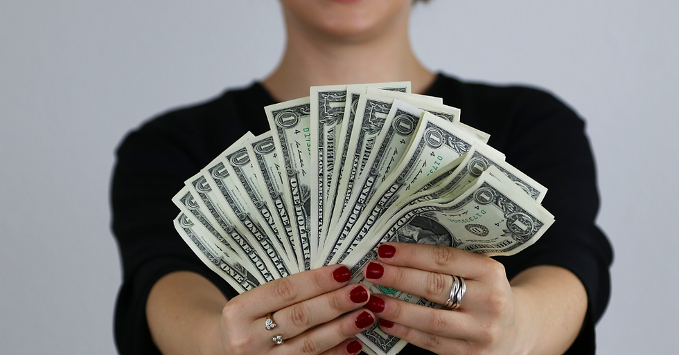 woman holding money
