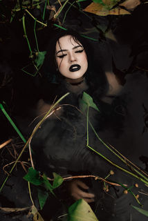 goth girl in dark water