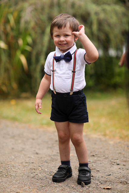 Alternative wedding couple with black wedding dress and black suit at oregon farmhouse