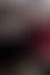 Well and natural lit professional photographer with camera in urban residentialPortland