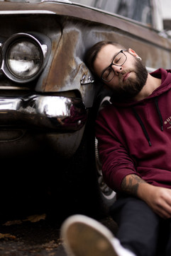 Well and natural lit professional photographer with camera in urban residentialPortland