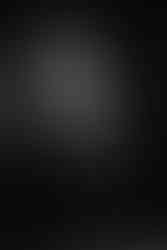 A romantic red Valentine's engagement shoot in Professional Portland photo studio by Wedding Photographer Guy