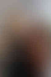 Alternative wedding couple with black wedding dress and black suit at oregon farmhouse