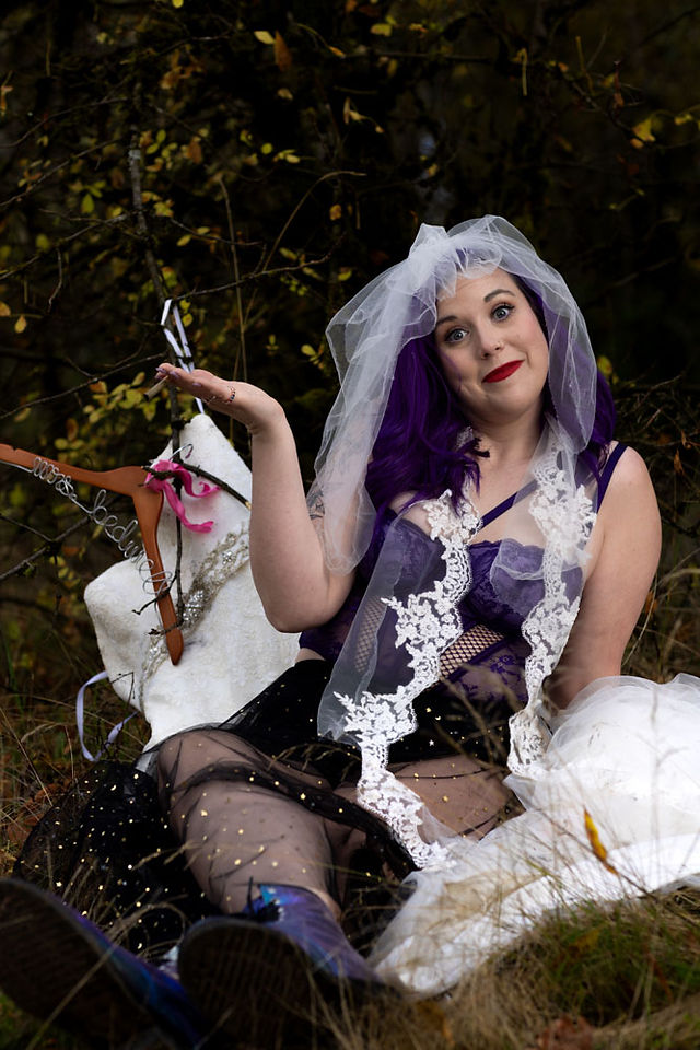 Trash and burn the wedding dress divorce photo of happy ex-bride self empowerment boudoir