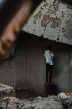 Surreal portrait of man in rubble