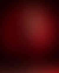 A romantic red Valentine's engagement shoot in Professional Portland photo studio by Wedding Photographer Guy