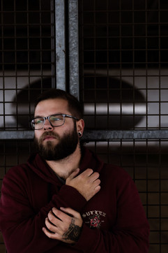 Well and natural lit professional photographer with camera in urban residentialPortland