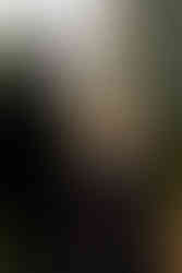 Alternative wedding couple with black wedding dress and black suit at oregon farmhouse