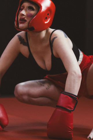 Avant garde sexy vulgar anti boudoir art portraits in boxing outfit