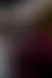 Well and natural lit professional photographer with camera in urban residentialPortland