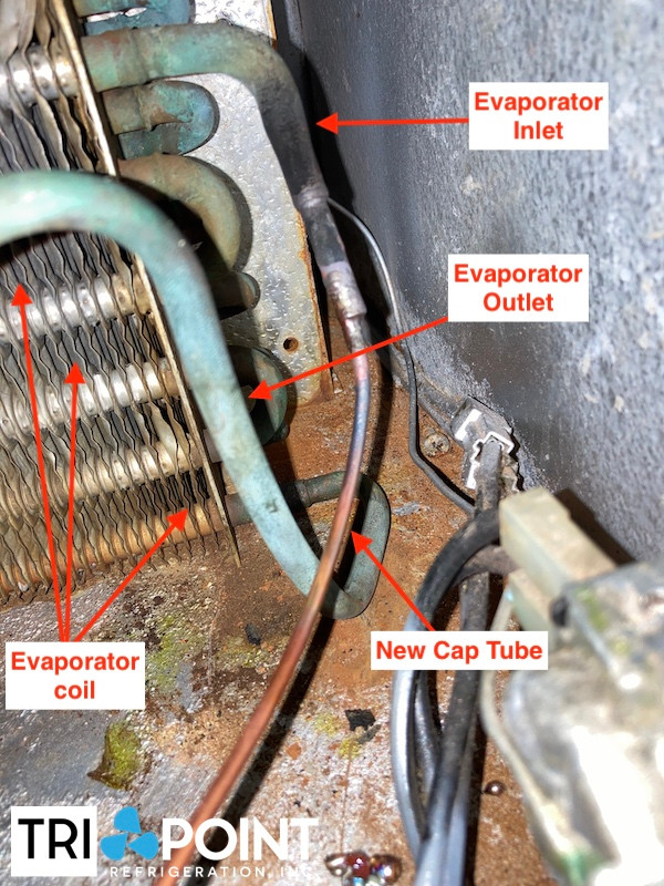capilary tube welded to old evaporator inside 7-up vending machine