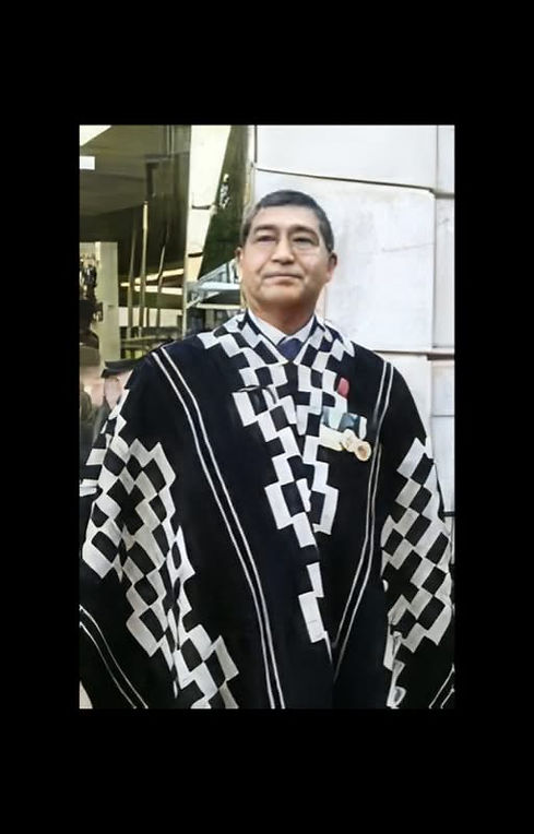 Werken Reynaldo Mariqueo poncho black and white photo.jpg
