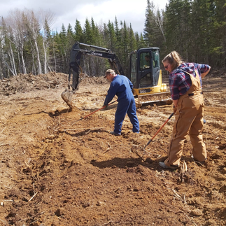 People Preparing the fields for planting