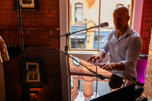 Live music and atmosphere at Fade Street Social, Dublin with man playing piano