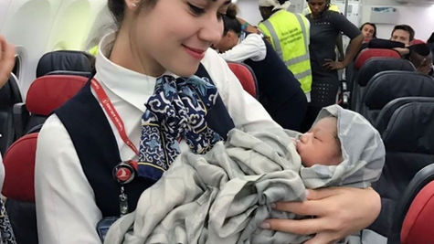 How Airlines Manage In-Flight Baby Deliveries