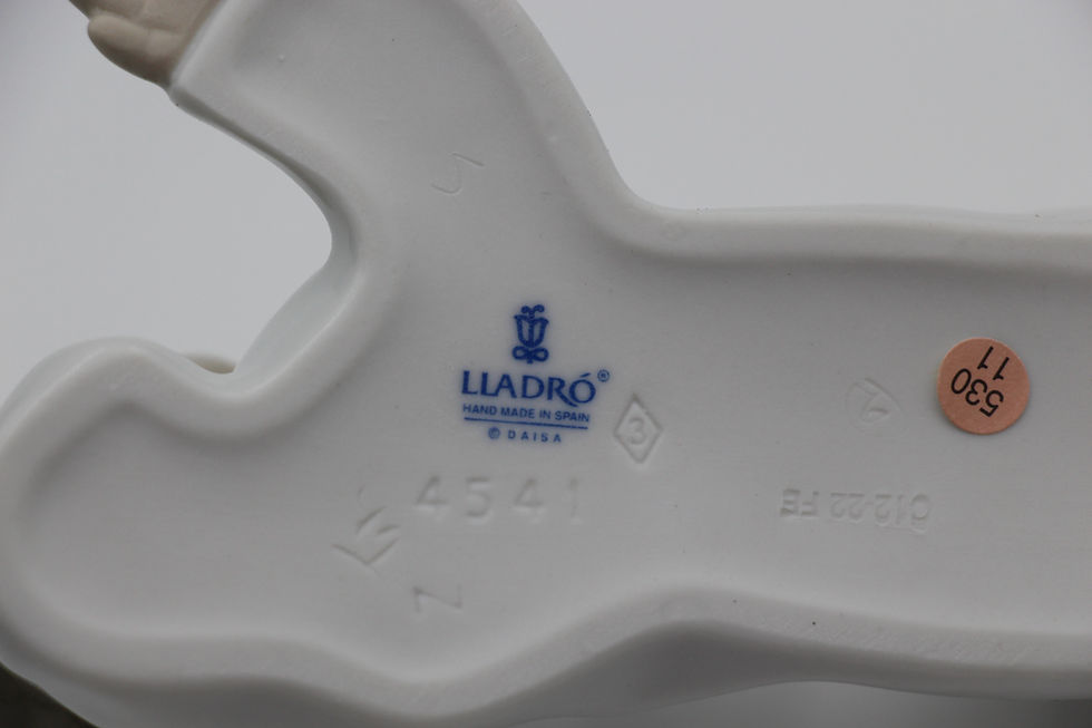 Thumbnail: LLADRO Porcelain Figurine of an Angel Lying Down Sculpted by Fulgencio Garcia