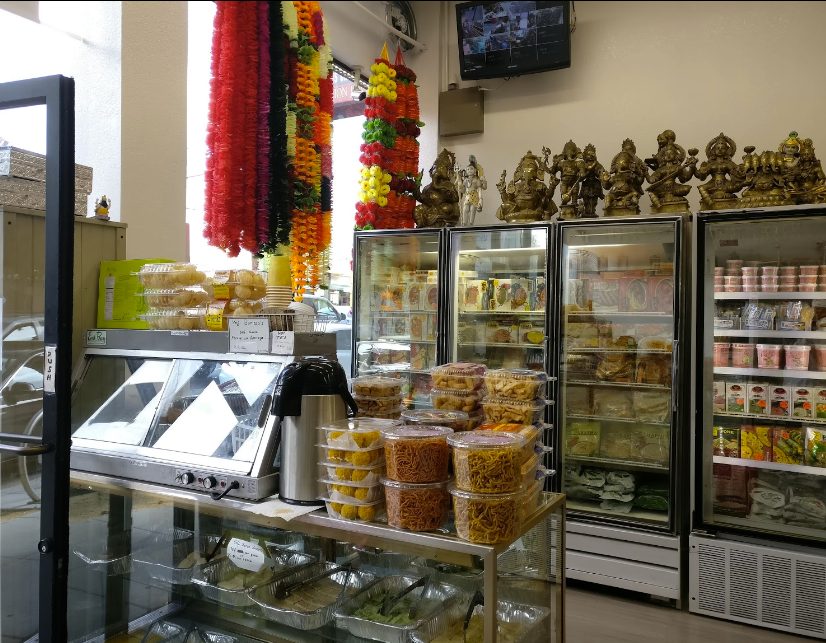 Fresh sweets, chai, and samosas.