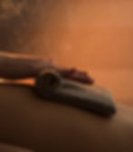 close-up-therapist-hand-massaging-woman-s-back-with-hot-towel-spa (1).jpg