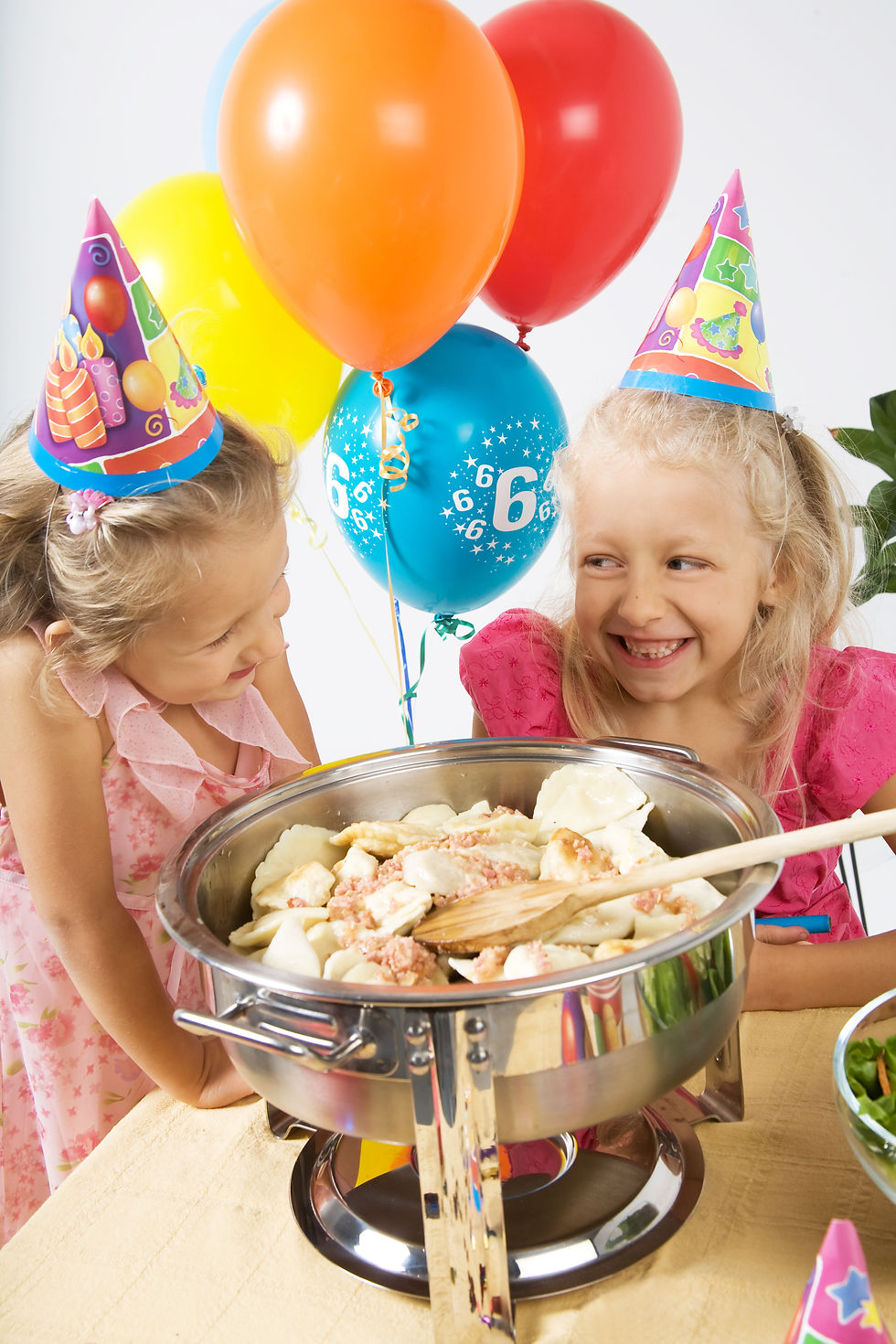 Kids having birthday party looking at a pot with Best Pierogi