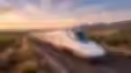 High-speed AVE train traveling through Spain countryside