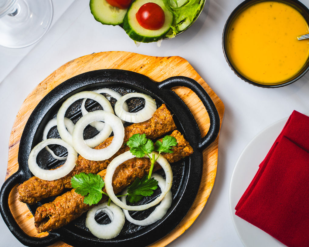 Grilled kebabs with onion rings at Bengal Pride in Hull