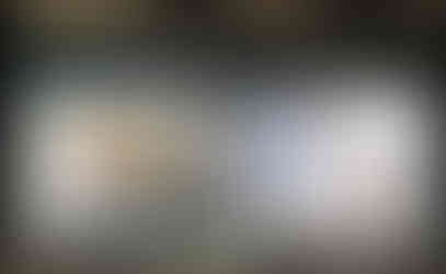 Apartheid Apartments: Night-time view of real estate storefront