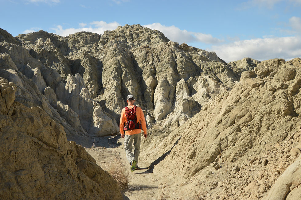hikes through rocky, rugged terrain of the Mecca Hills