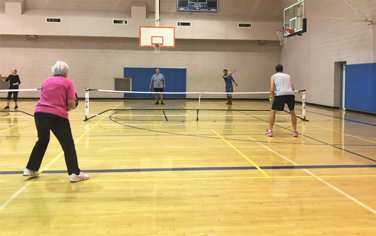 Playing Pickleball in Palm Desert gym