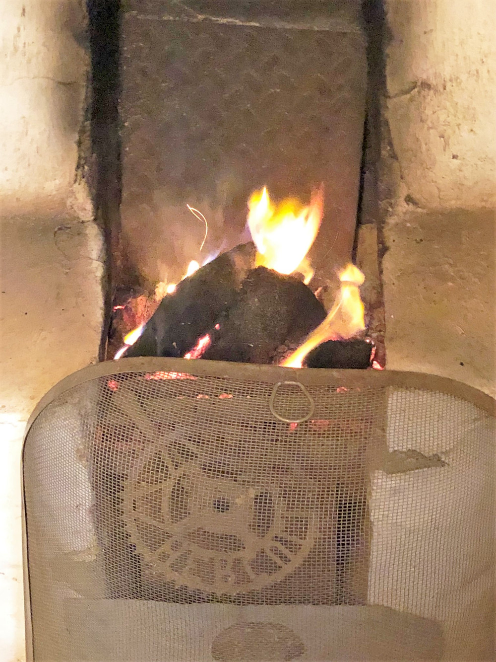 A fire in the small central hearth kept the Gearrannan Blackhouses warm