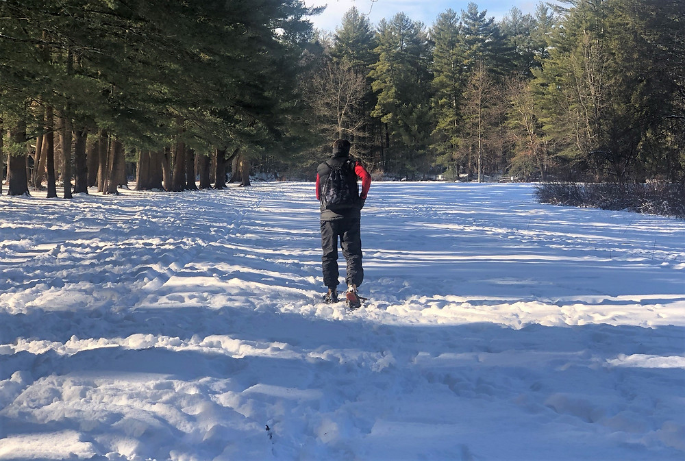 Snowshoeing in Groton Place along Nashua River