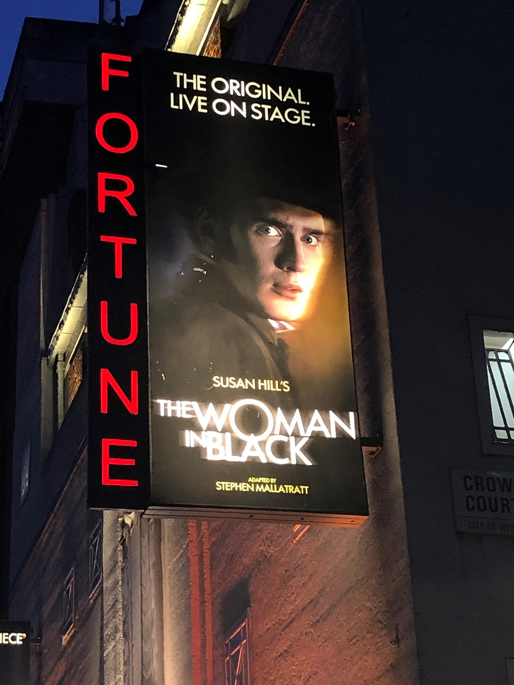 Theatre marquee for play ‘The Woman in Black’ at the Fortune Theatre in London
