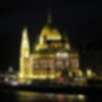 The domes and spires of the Hungarian Parliament Building at night