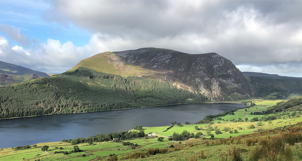 Views of toward Llyn Cwellyn and the crags of Mynndd Mawr on the Ranger Path leading to the summit of Snowdon