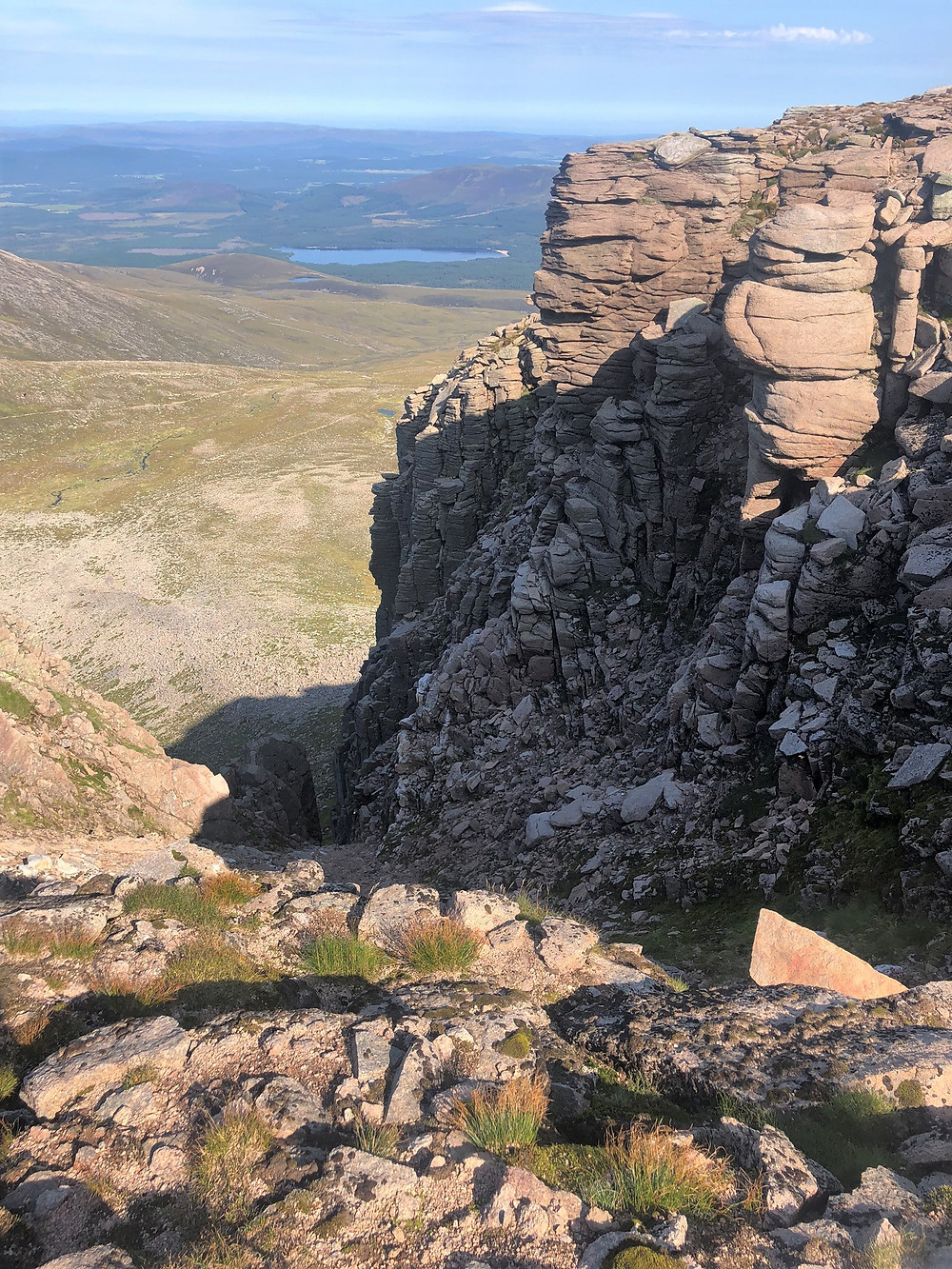 At the summit of Cairn Lochan cliffs. Cairn Gorm hike via the Northern Corries