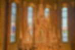 Beautiful stained-glass windows encircling the main altar at Matthias Church in Budapest.