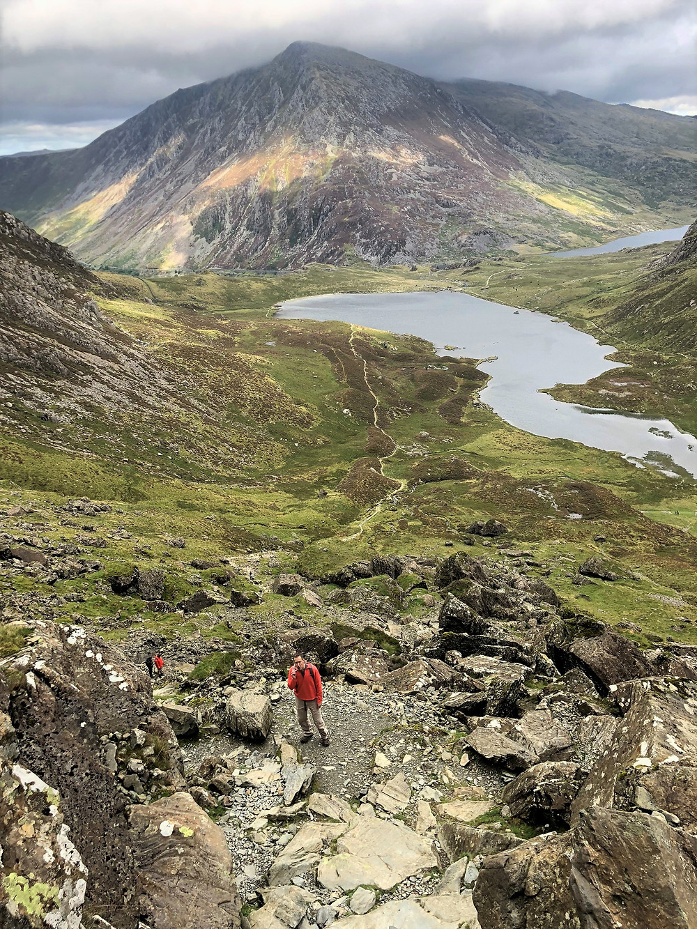 The 3,209 foot summit of Pen yr Ole Wen covered in clouds viewed from the top of Devil’s Kitchen in Snowdonia