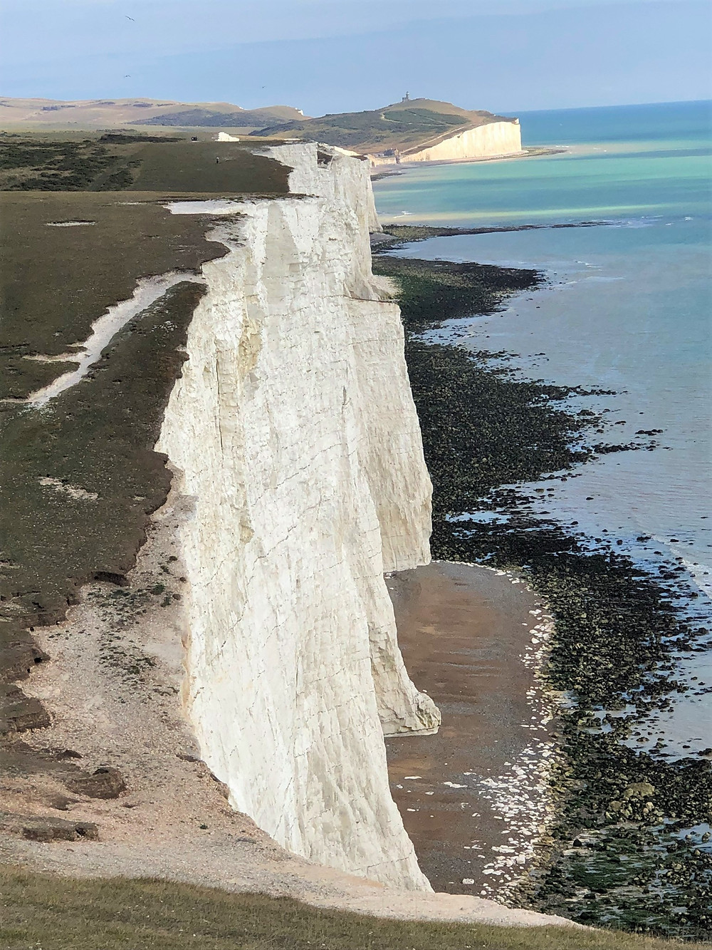 A view of Short Brow and Rough Brow from the top of Haven Brow one of the Seven Sisters Cliffs in England