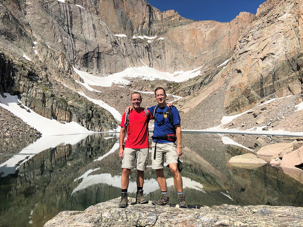 Chasm Lake sits in front of you in a grand cirque below the towering Longs Peak of Rocky Mountain National Park