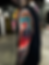 Vibrant upper arm tattoo of a blindfolded woman's profile.