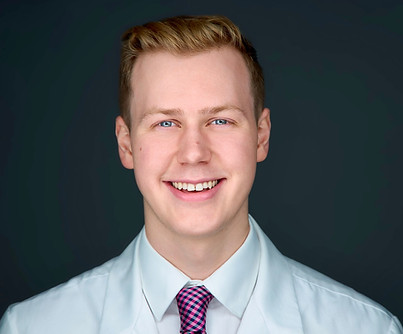 full headshot warmer web cropped .jpeg