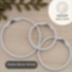 Set of three Matte Bone White round embroidery hoops on light wood background, styled with a green crochet plant
